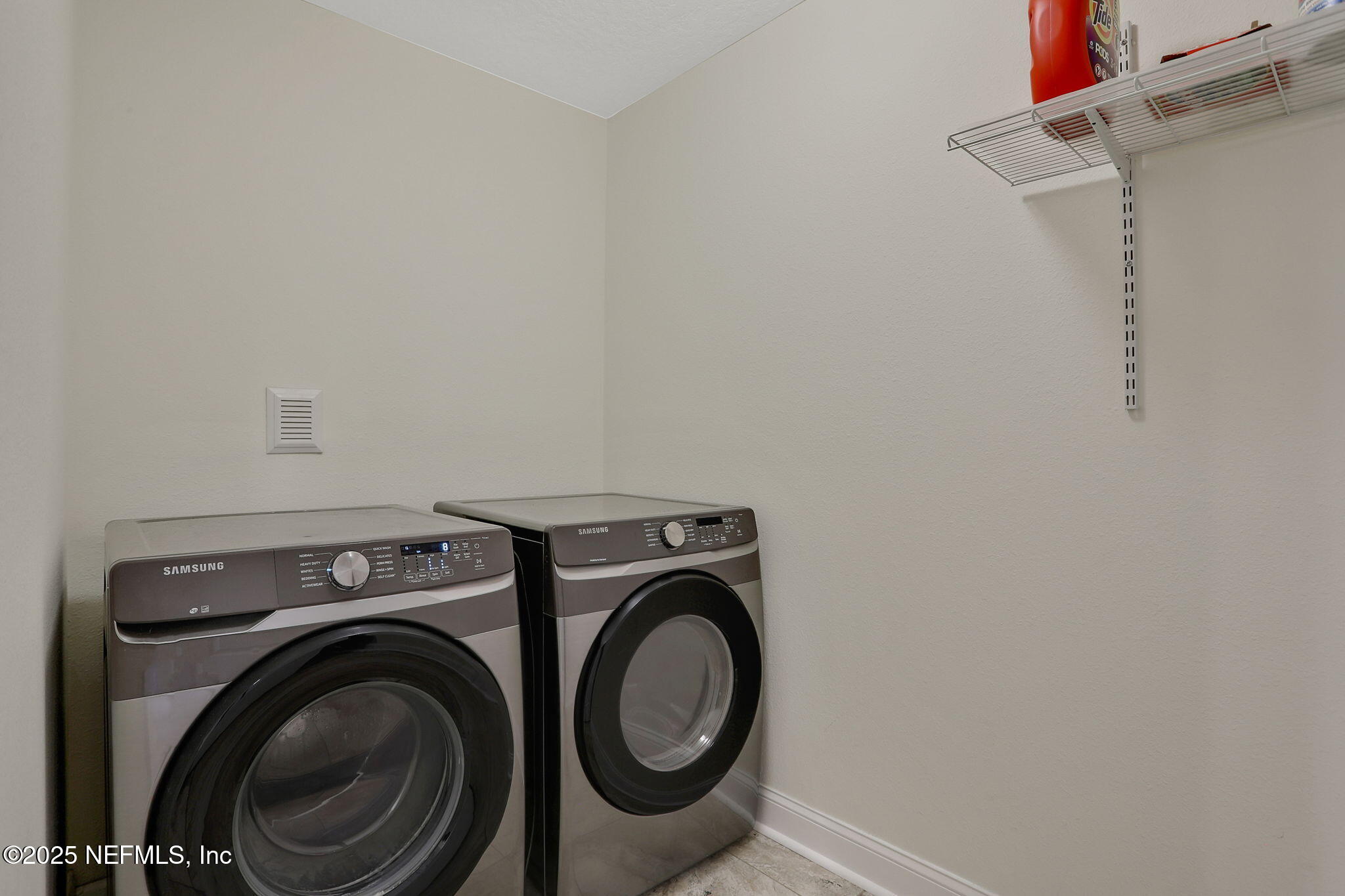 35 Root Lane St. Augustine, FL 32084 - Photo 31 of 37 a utility room with dryer and washer