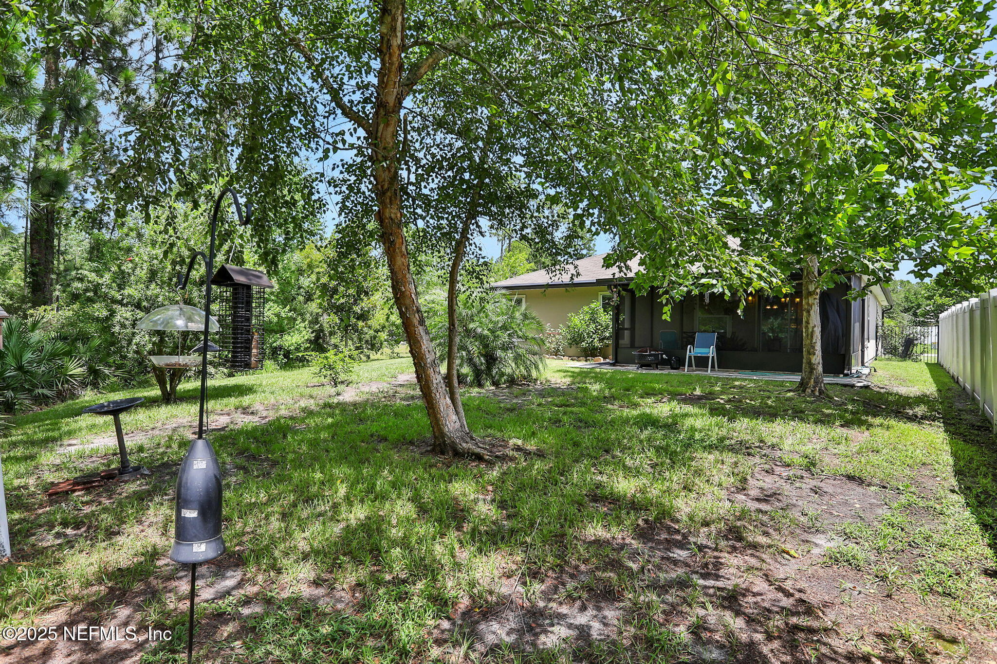 35 Root Lane St. Augustine, FL 32084 - Photo 35 of 37 a view of a house with a backyard
