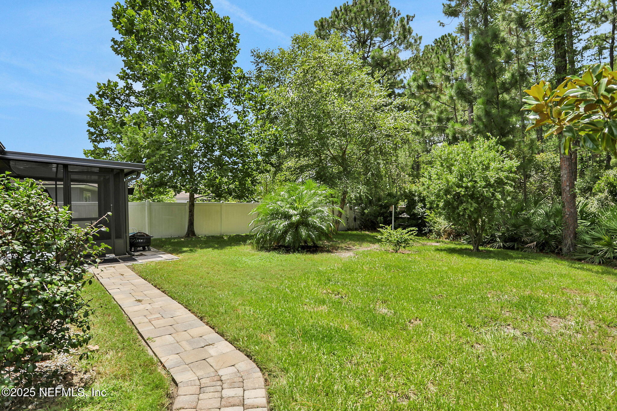 35 Root Lane St. Augustine, FL 32084 - Photo 37 of 37 a view of a backyard with large trees