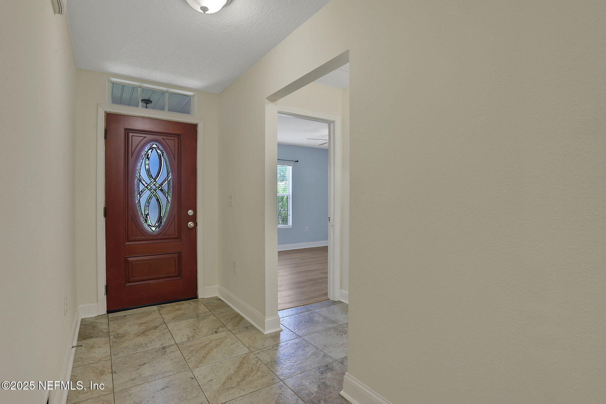 35 Root Lane St. Augustine, FL 32084 - Photo 6 of 37 a view of front door with a hallway