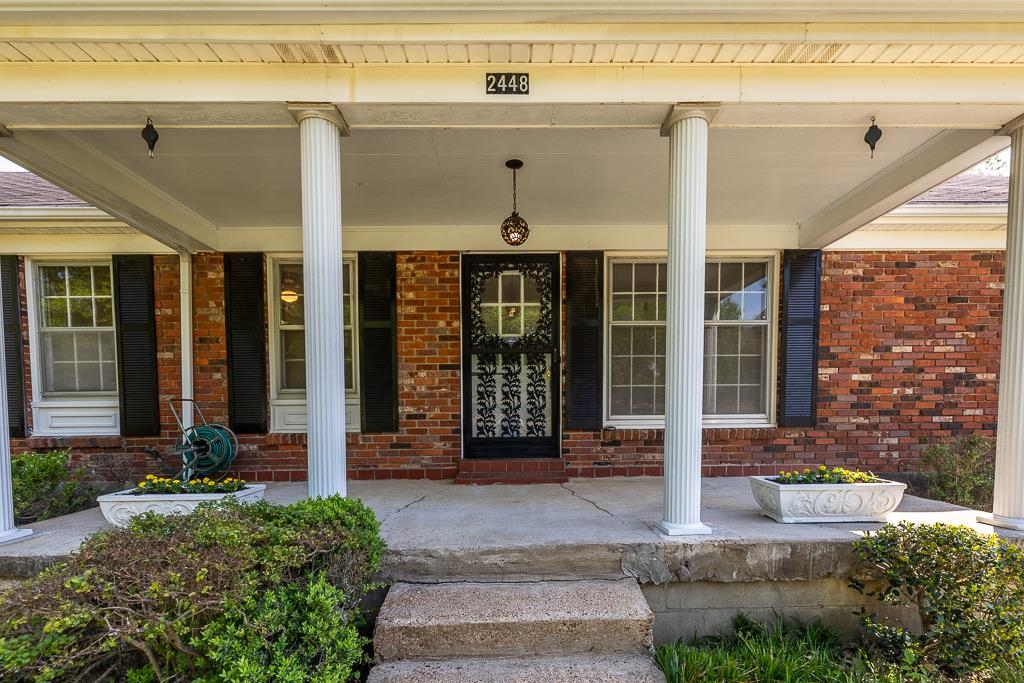 2448 Elmore Park Road Bartlett, TN 38134 - Photo 2 of 28 a front view of a house
