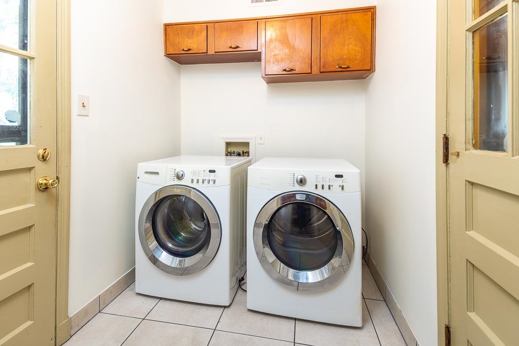 2448 Elmore Park Road Bartlett, TN 38134 - Photo 28 of 28 a utility room with dryer and washer