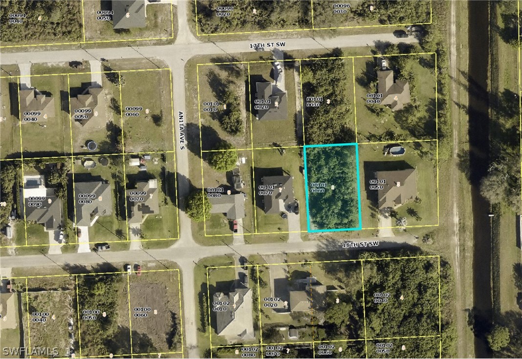 2502 18th Street Southwest Lehigh Acres, FL 33976 - Photo 2 of 2 a picture of a bathroom with a sink and mirror