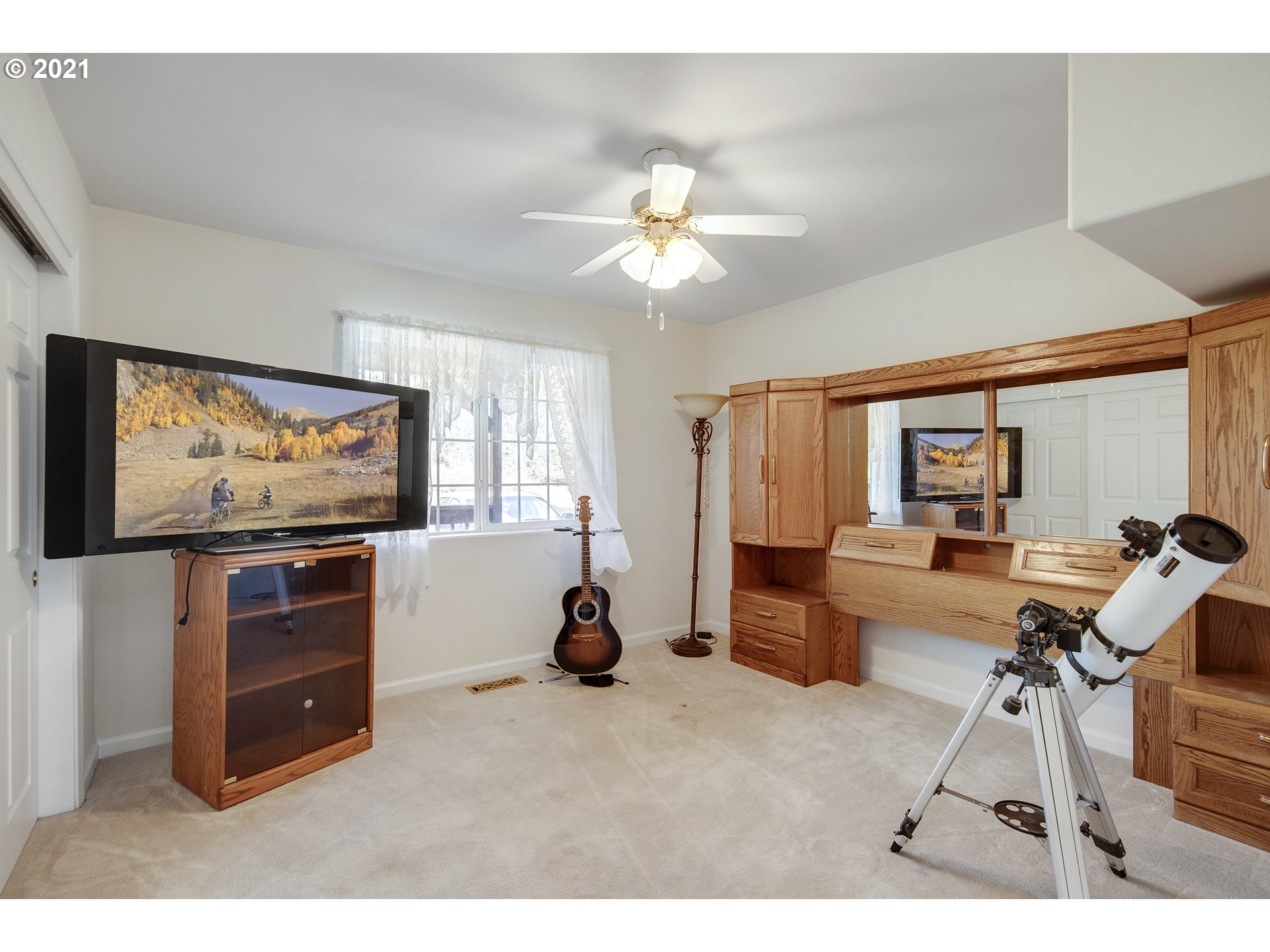 46400 Southwest Hebo Road Grand Ronde, OR 97347 - Photo 11 of 26 a living room with furniture and a flat screen tv