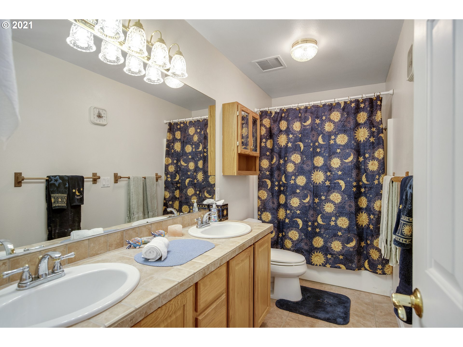 46400 Southwest Hebo Road Grand Ronde, OR 97347 - Photo 13 of 26 a bathroom with a sink vanity granite and a mirror