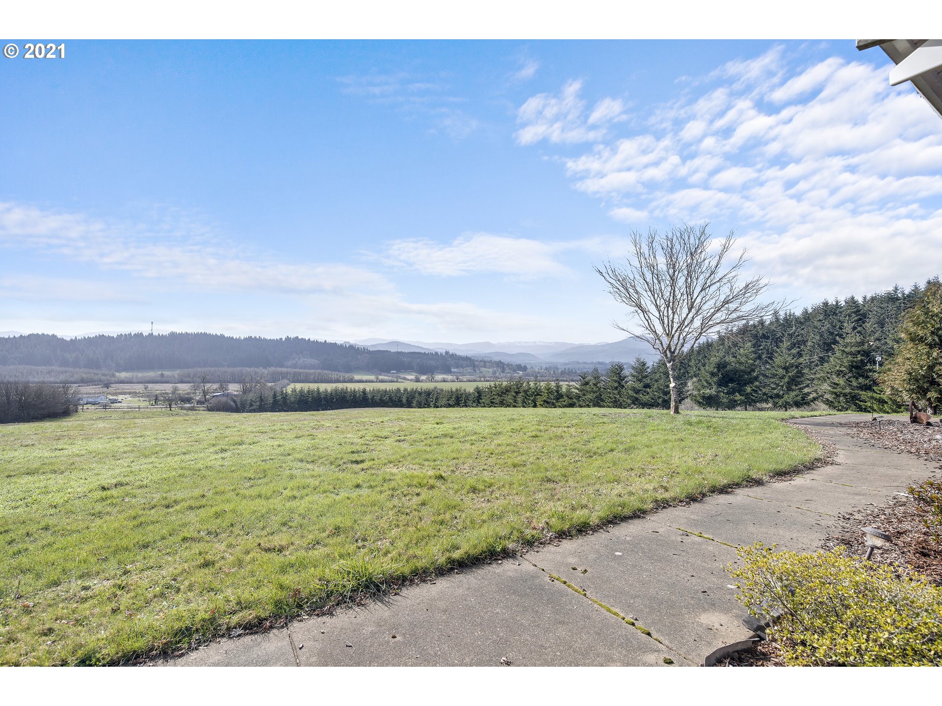 46400 Southwest Hebo Road Grand Ronde, OR 97347 - Photo 24 of 26 a view of an ocean beach and a yard