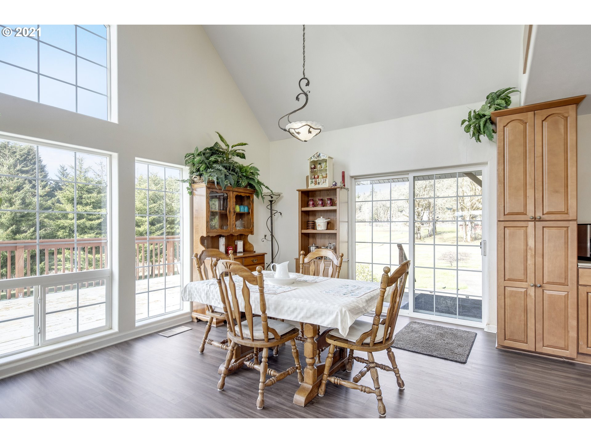 46400 Southwest Hebo Road Grand Ronde, OR 97347 - Photo 7 of 26 a view of a dining room with furniture window and wooden floor