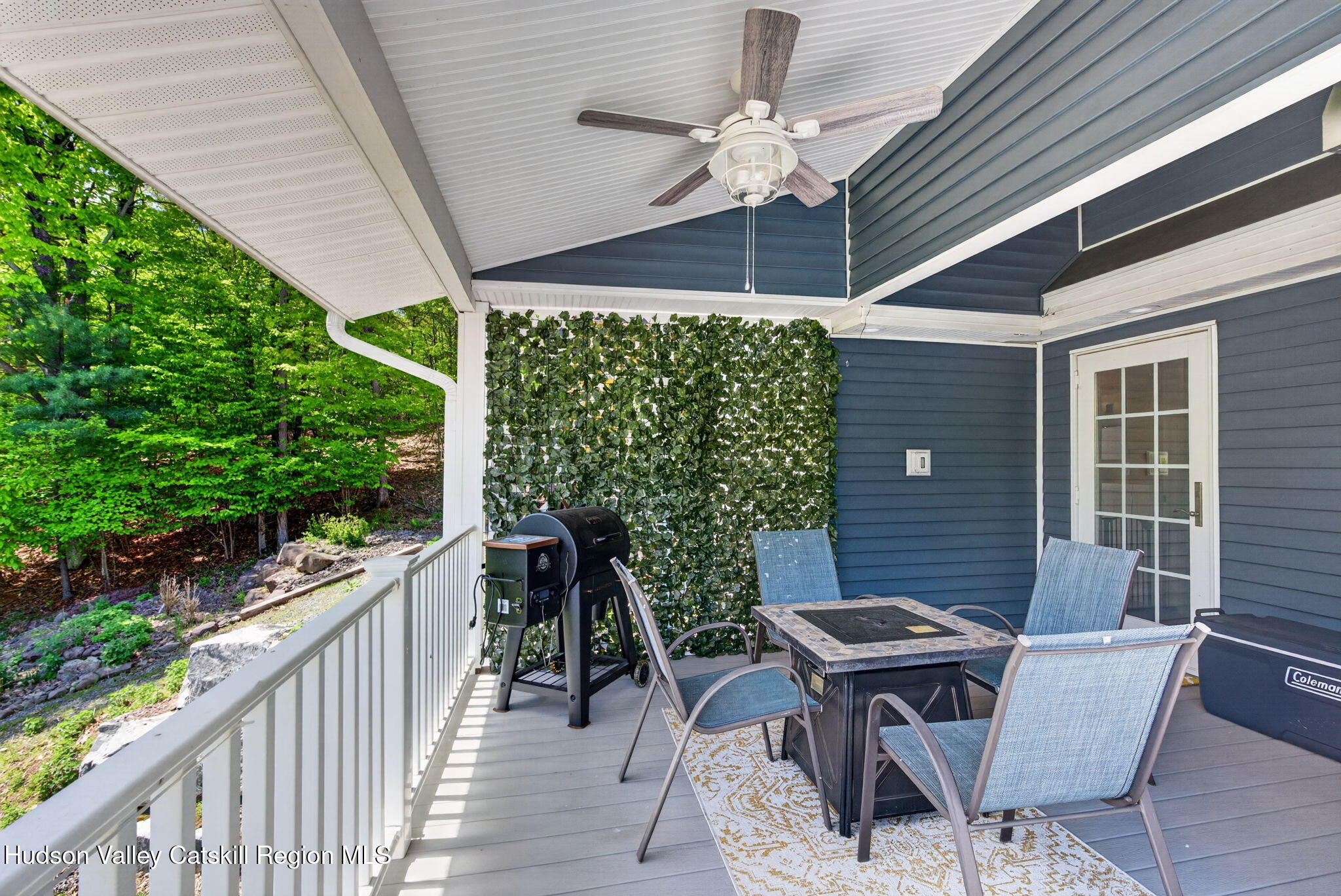 322 Morrison Road Acra, NY 12405 - Photo 14 of 49 a patio with table and chairs and potted plants