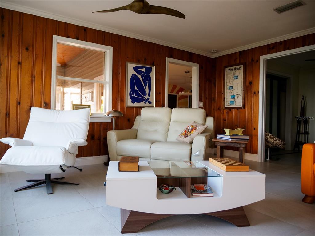 1711 County Road 13 South Elkton, FL 32033 - Photo 27 of 78 a living room with furniture and a large window