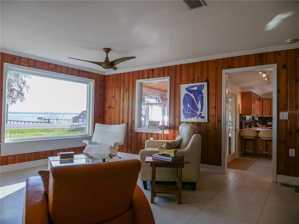 1711 County Road 13 South Elkton, FL 32033 - Photo 46 of 78 a living room with furniture and a large window