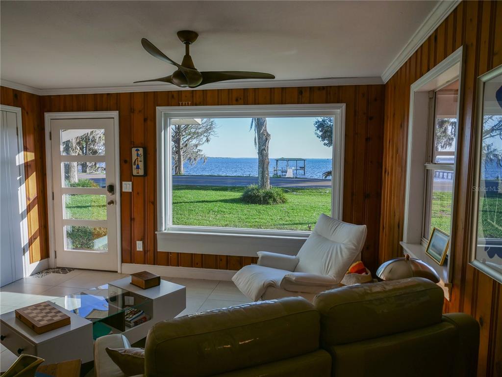 1711 County Road 13 South Elkton, FL 32033 - Photo 48 of 78 a living room with furniture and a window