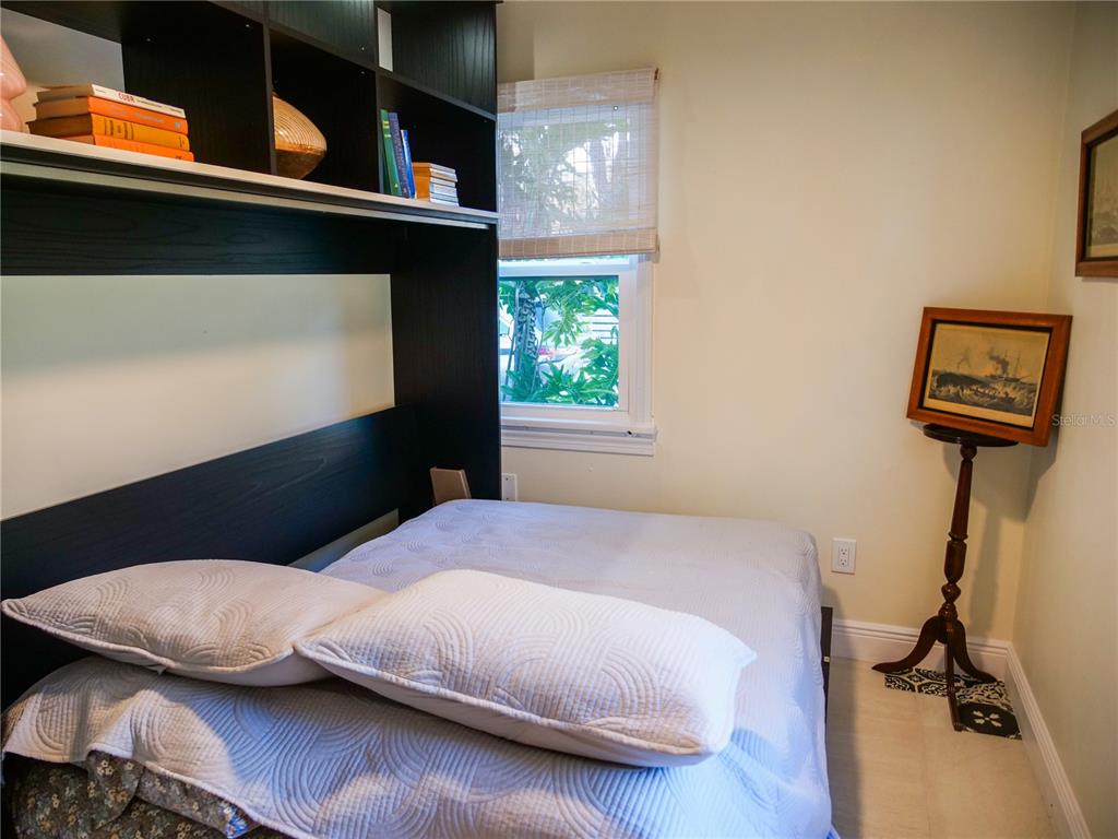 1711 County Road 13 South Elkton, FL 32033 - Photo 61 of 78 a bedroom with a bed and a window