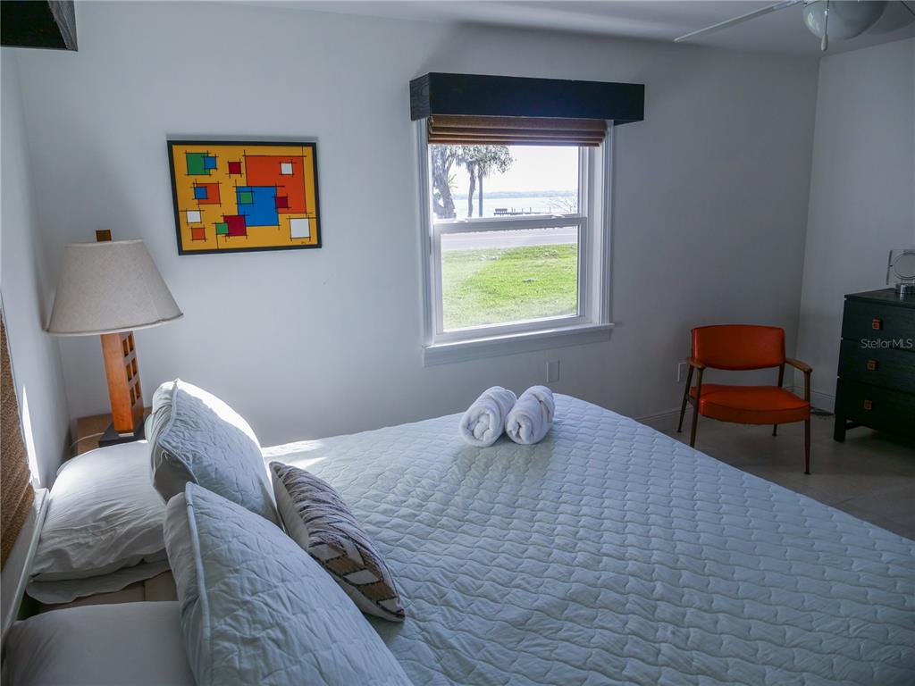 1711 County Road 13 South Elkton, FL 32033 - Photo 67 of 78 a bedroom with a bed and a desk