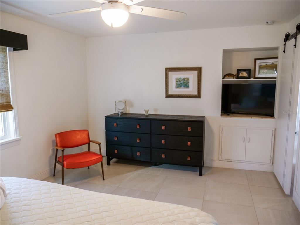 1711 County Road 13 South Elkton, FL 32033 - Photo 73 of 78 a room with a bed and a television