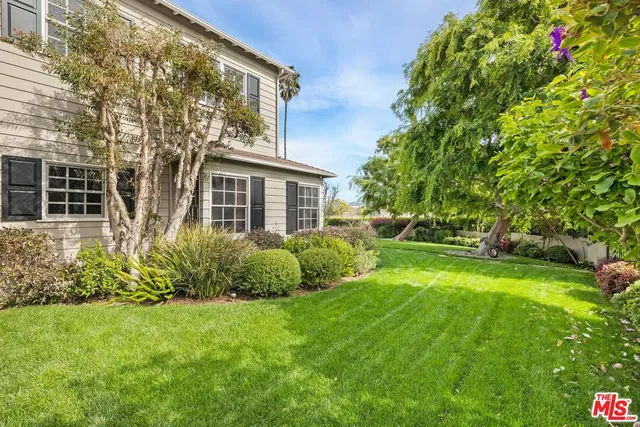 a view of outdoor space with deck and green space