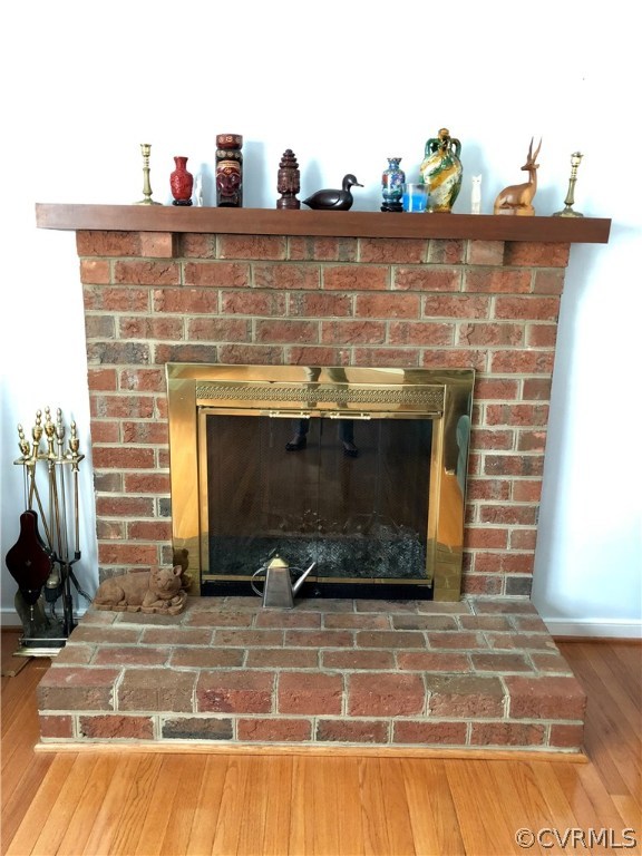 10612 Tokay Road Chesterfield, VA 23832 - Photo 14 of 18 a view of living room with furniture and a fireplace