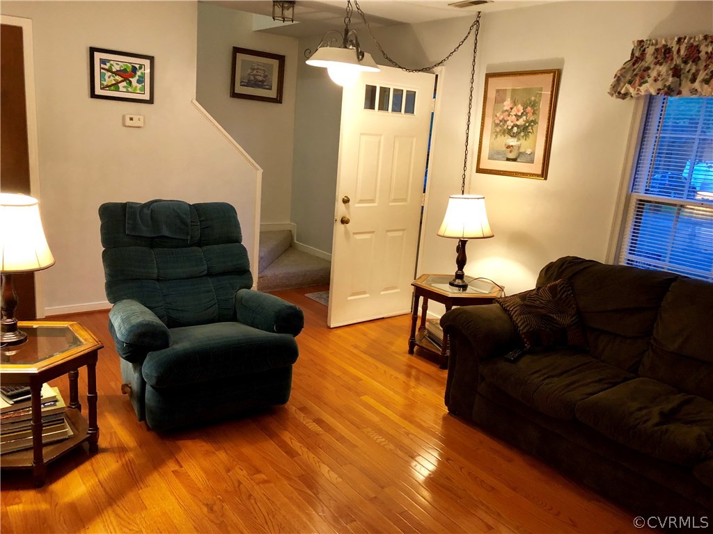 10612 Tokay Road Chesterfield, VA 23832 - Photo 15 of 18 a living room with furniture and a lamp