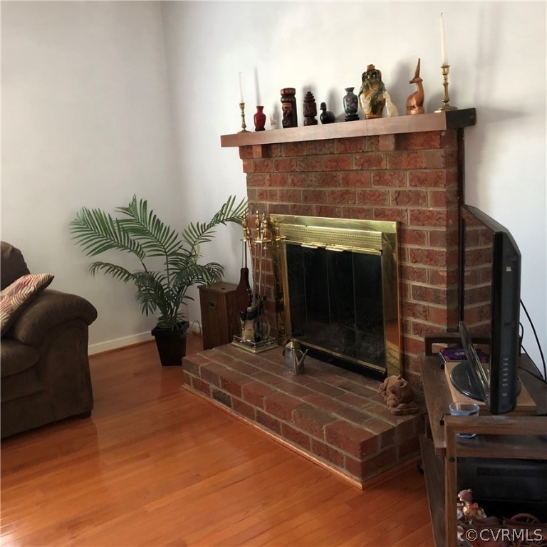 10612 Tokay Road Chesterfield, VA 23832 - Photo 16 of 18 a living room with furniture and a fireplace
