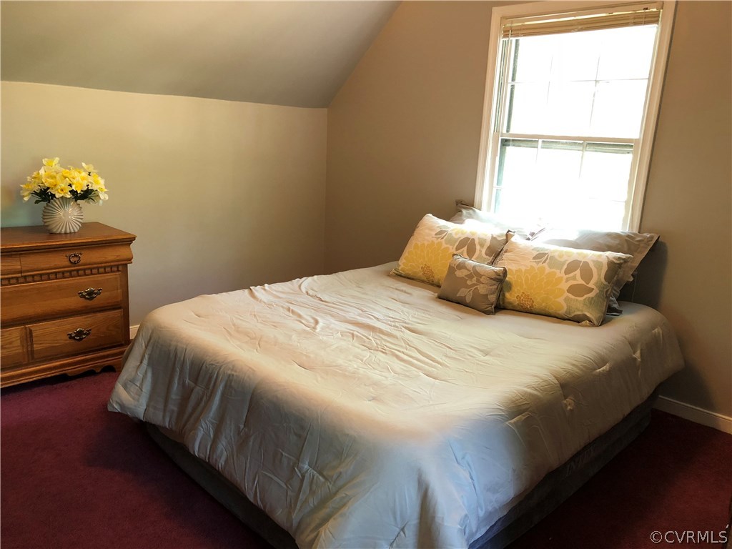 10612 Tokay Road Chesterfield, VA 23832 - Photo 3 of 18 a bedroom with a bed and a window