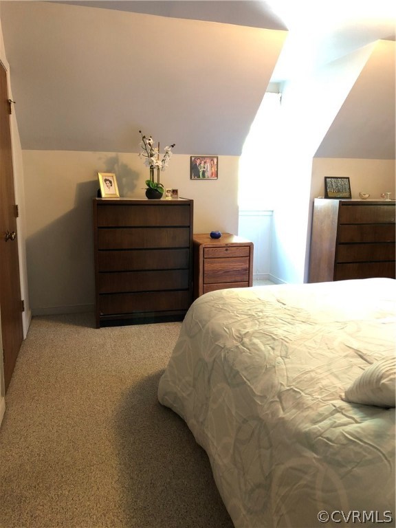 10612 Tokay Road Chesterfield, VA 23832 - Photo 4 of 18 a bed sitting in a bedroom and dresser