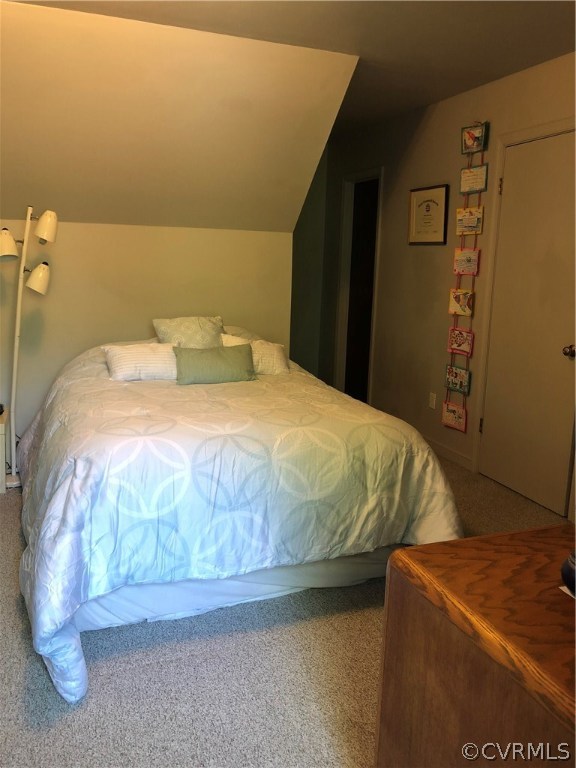 10612 Tokay Road Chesterfield, VA 23832 - Photo 5 of 18 a bedroom with a bed and a night stand