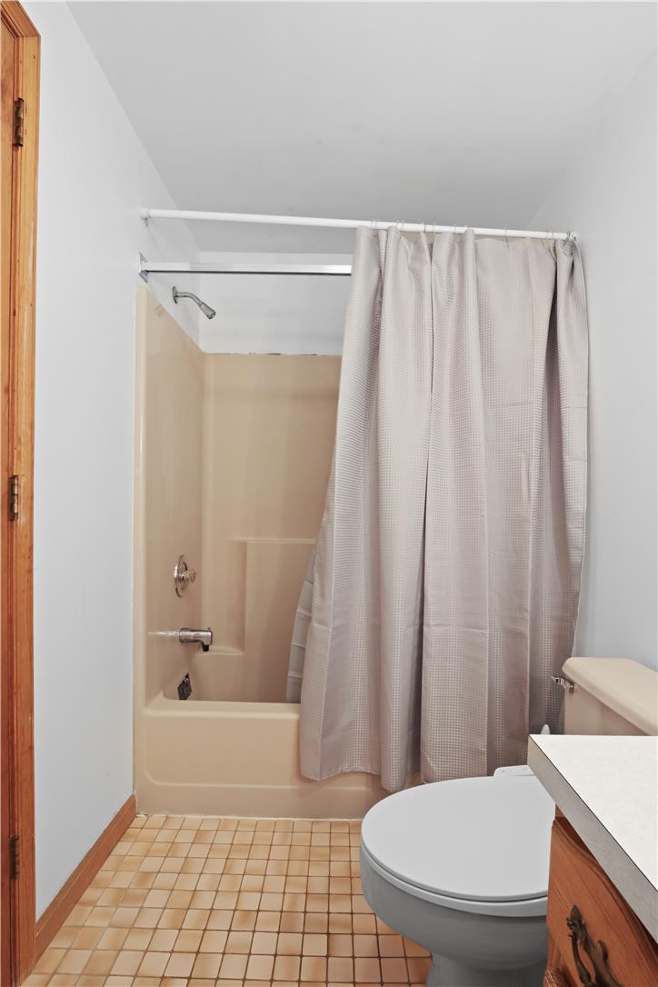 209 Remington Road East Stroudsburg, PA 18301 - Photo 31 of 41 A compact bathing area featuring a combination shower and tub.