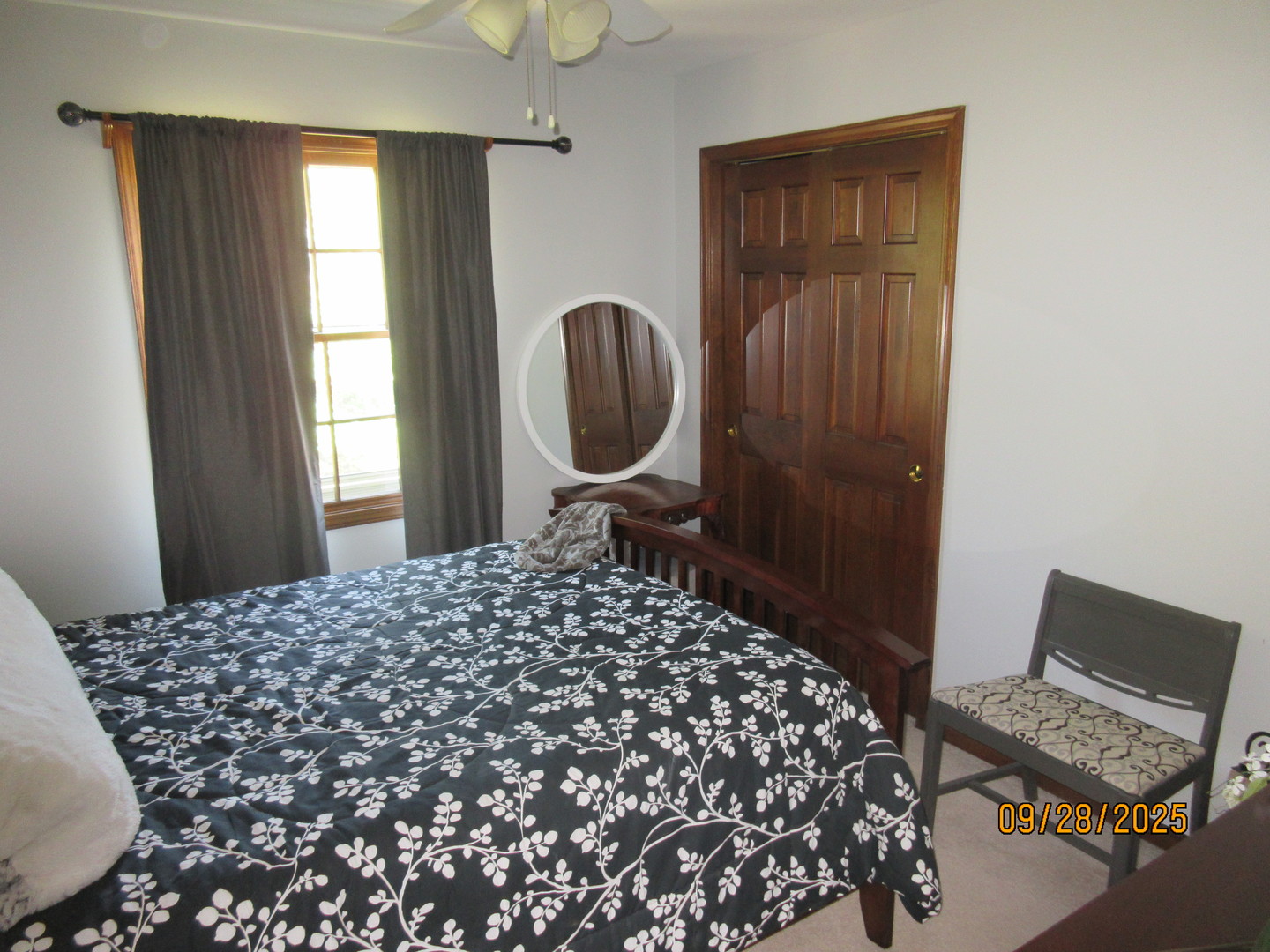 1099 West Jefferson Avenue Naperville, IL 60540 - Photo 17 of 19 a bedroom with a bed and a window