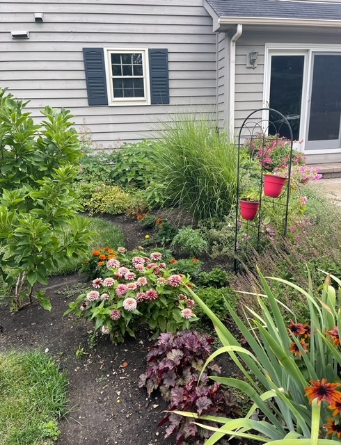 1099 West Jefferson Avenue Naperville, IL 60540 - Photo 6 of 19 a backyard of a house with a yard and outdoor seating