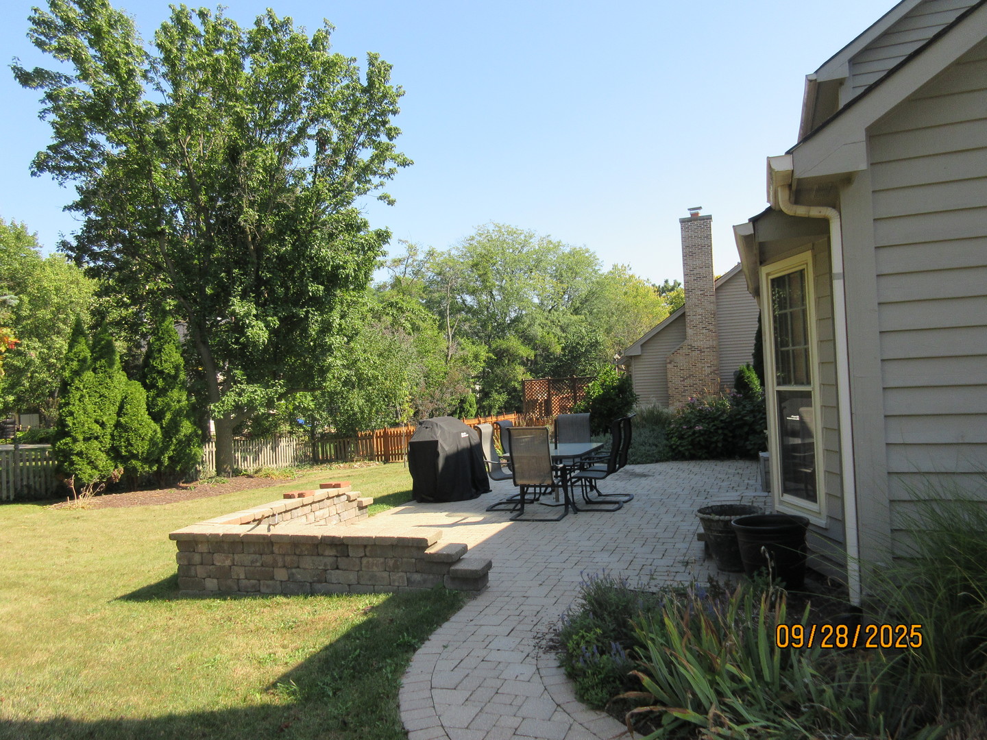 1099 West Jefferson Avenue Naperville, IL 60540 - Photo 7 of 19 a swimming pool with outdoor seating and yard