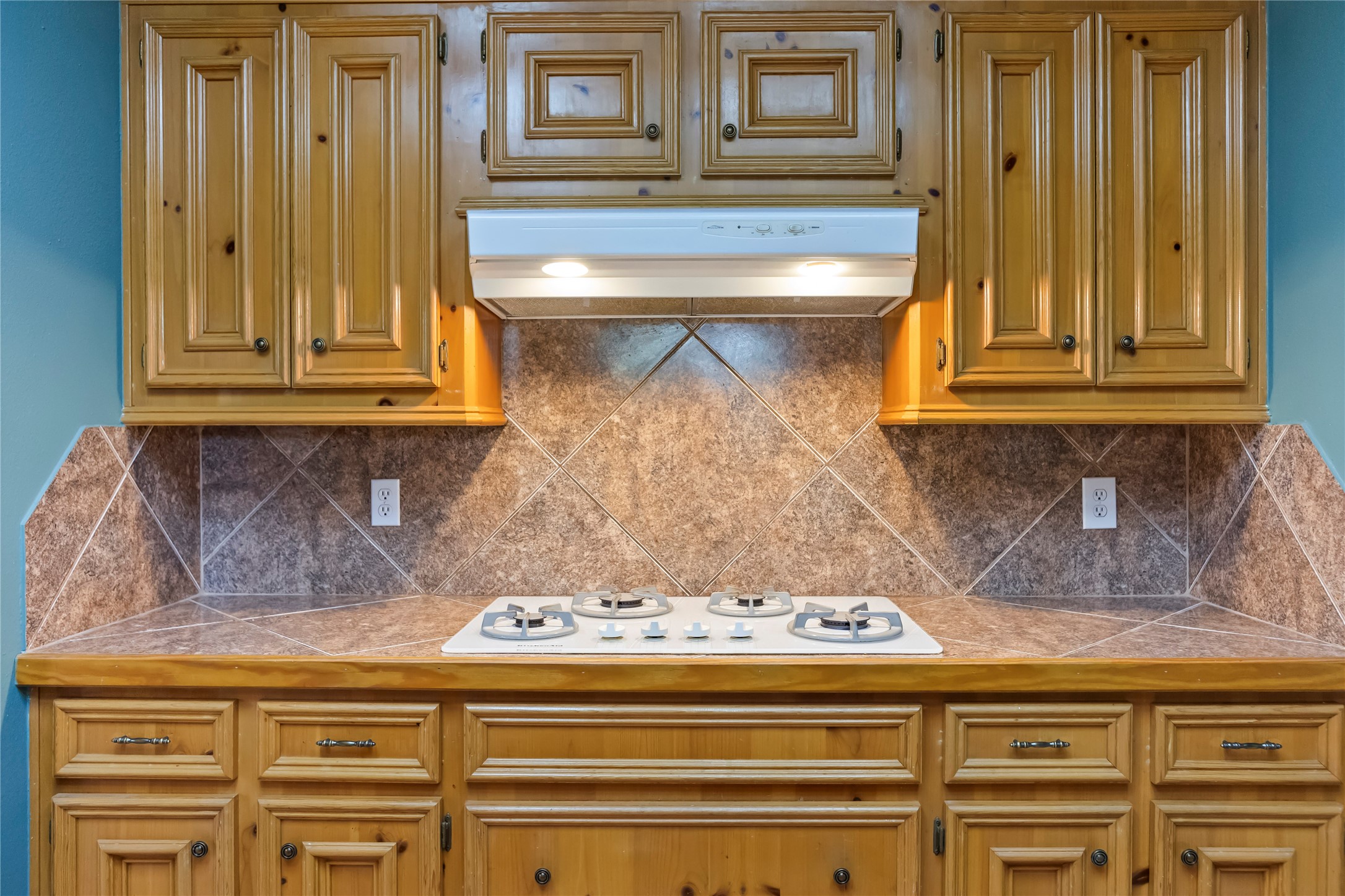 22916 East Martin Drive Porter, TX 77365 - Photo 9 of 43 a stove top oven sitting inside of a kitchen