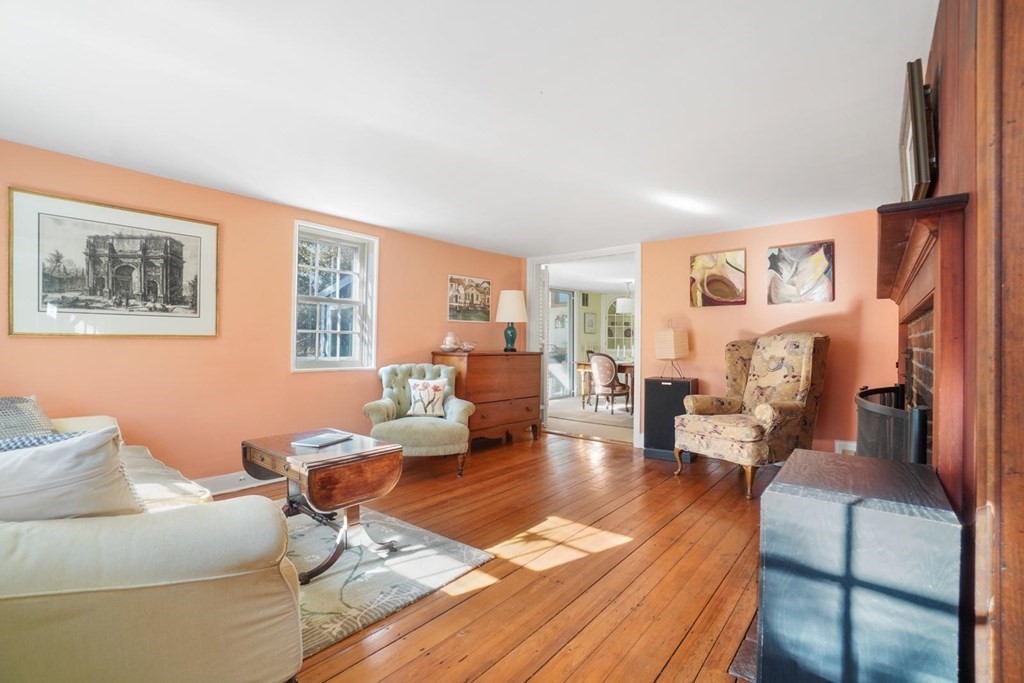 1219 High Street Westwood, MA 02090 - Photo 11 of 30 a living room with furniture and a table