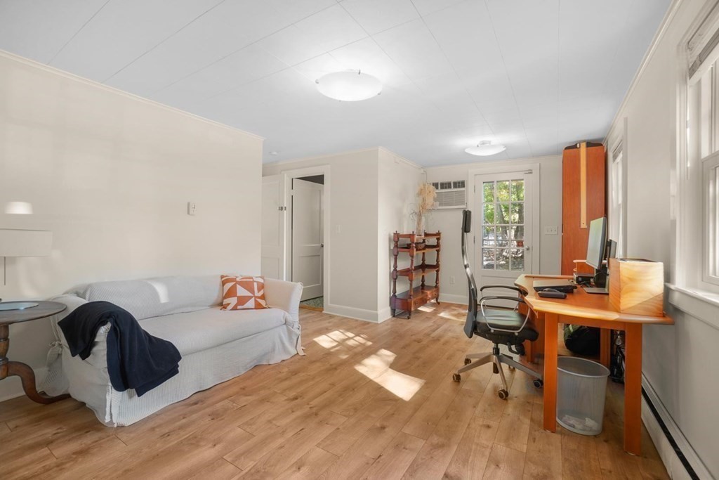 1219 High Street Westwood, MA 02090 - Photo 16 of 30 a living room with furniture and a wooden floor