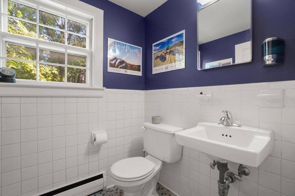 1219 High Street Westwood, MA 02090 - Photo 17 of 30 a bathroom with a sink mirror and toilet