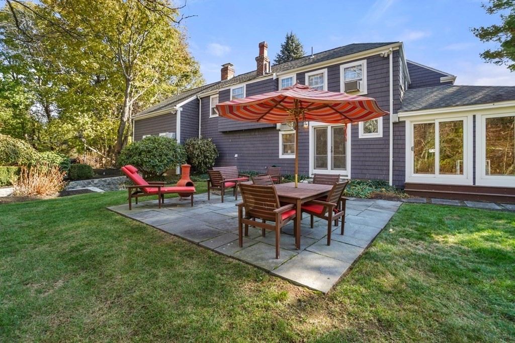 1219 High Street Westwood, MA 02090 - Photo 3 of 30 a view of a house with a yard and sitting area