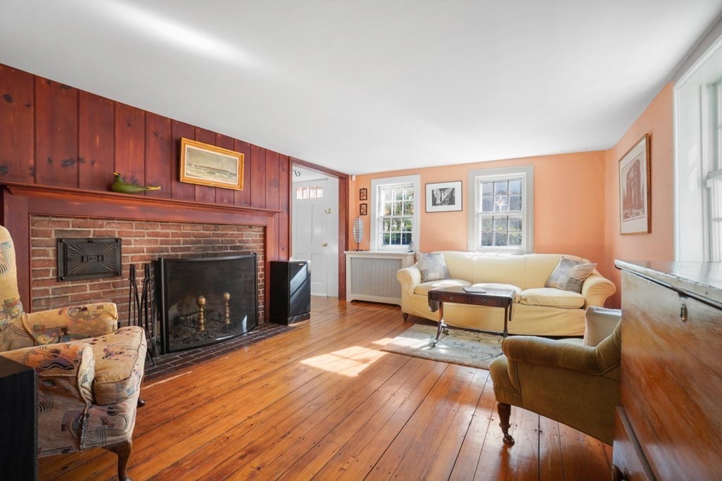 1219 High Street Westwood, MA 02090 - Photo 10 of 30 a living room with furniture and a fireplace