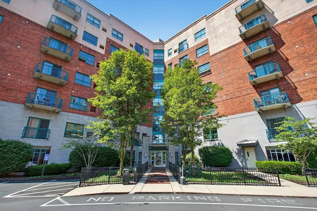 a front view of a multi story residential apartment building