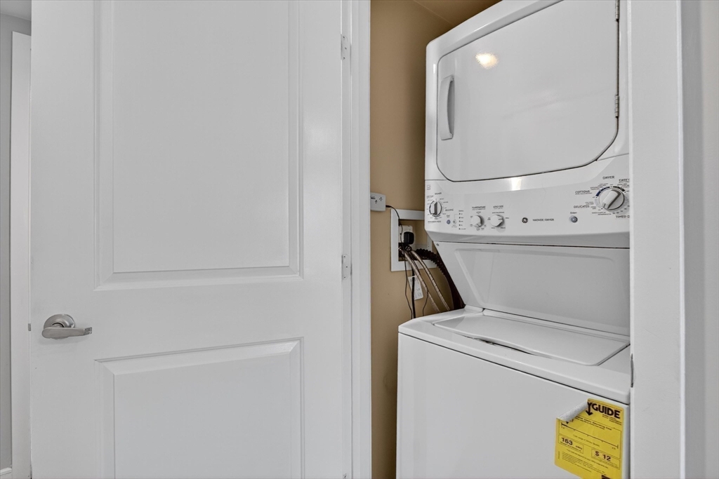 175 Cottage Street, Unit 312 Chelsea, MA 02150 - Photo 11 of 13 a utility room with dryer and washer