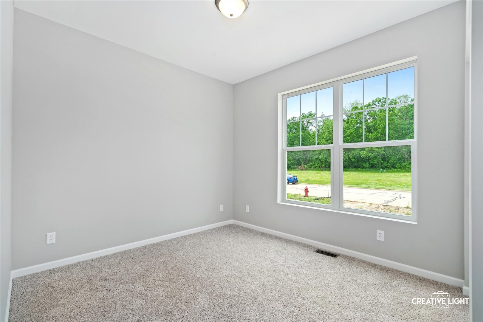 526 Hahn Drive Cortland, IL 60112 - Photo 13 of 20 an empty room with windows