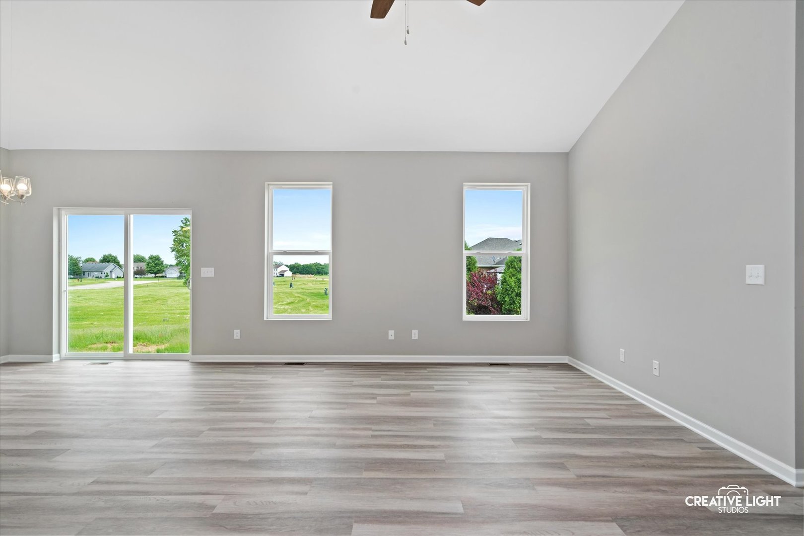 526 Hahn Drive Cortland, IL 60112 - Photo 5 of 20 a view of room with window and wooden floor