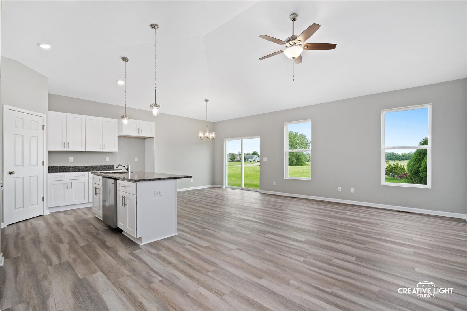 526 Hahn Drive Cortland, IL 60112 - Photo 7 of 20 a view of kitchen with sink and wooden floor