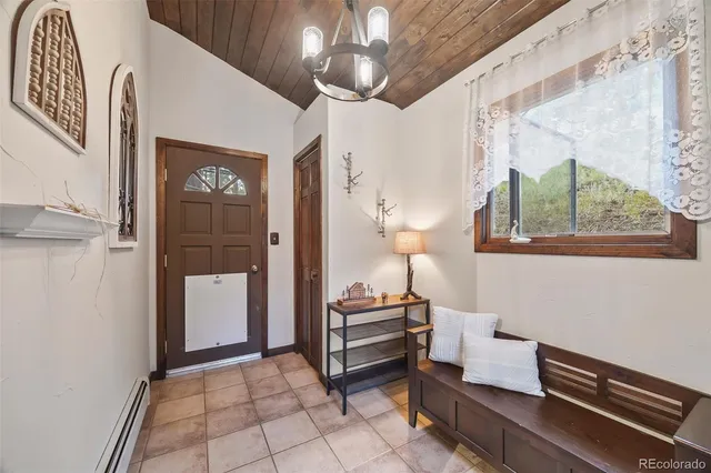 a room with furniture and a chandelier