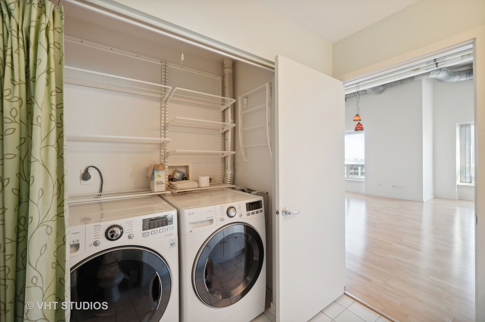1640 Maple Avenue, Unit 401 Evanston, IL 60201 - Photo 16 of 21 a view of washer and dryer in a utility room