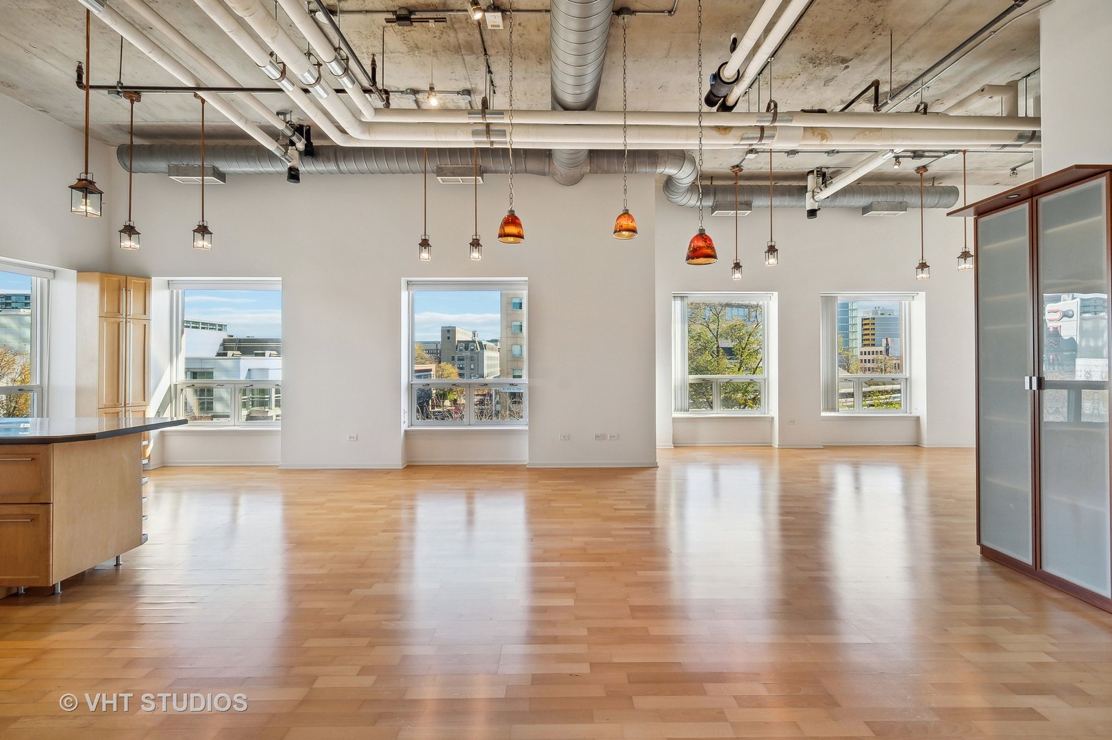 1640 Maple Avenue, Unit 401 Evanston, IL 60201 - Photo 2 of 21 a view of a room with wooden floors