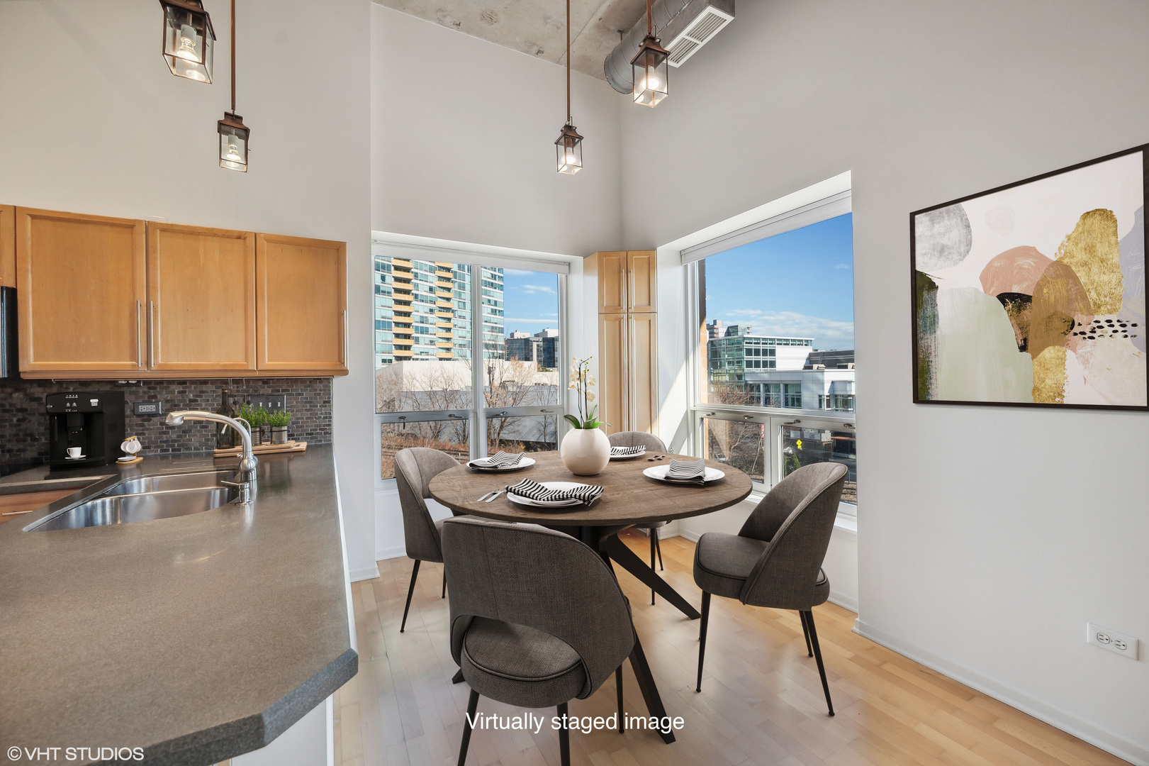1640 Maple Avenue, Unit 401 Evanston, IL 60201 - Photo 7 of 21 a dining room with furniture and a large window