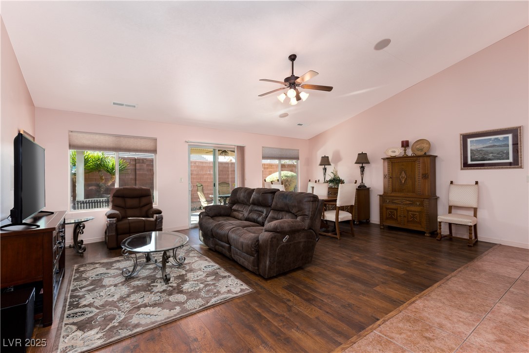 844 Sagedell Road Mesquite, NV 89027 - Photo 4 of 19 Living room with dark wood-type flooring, vaulted ceiling, and ceiling fan