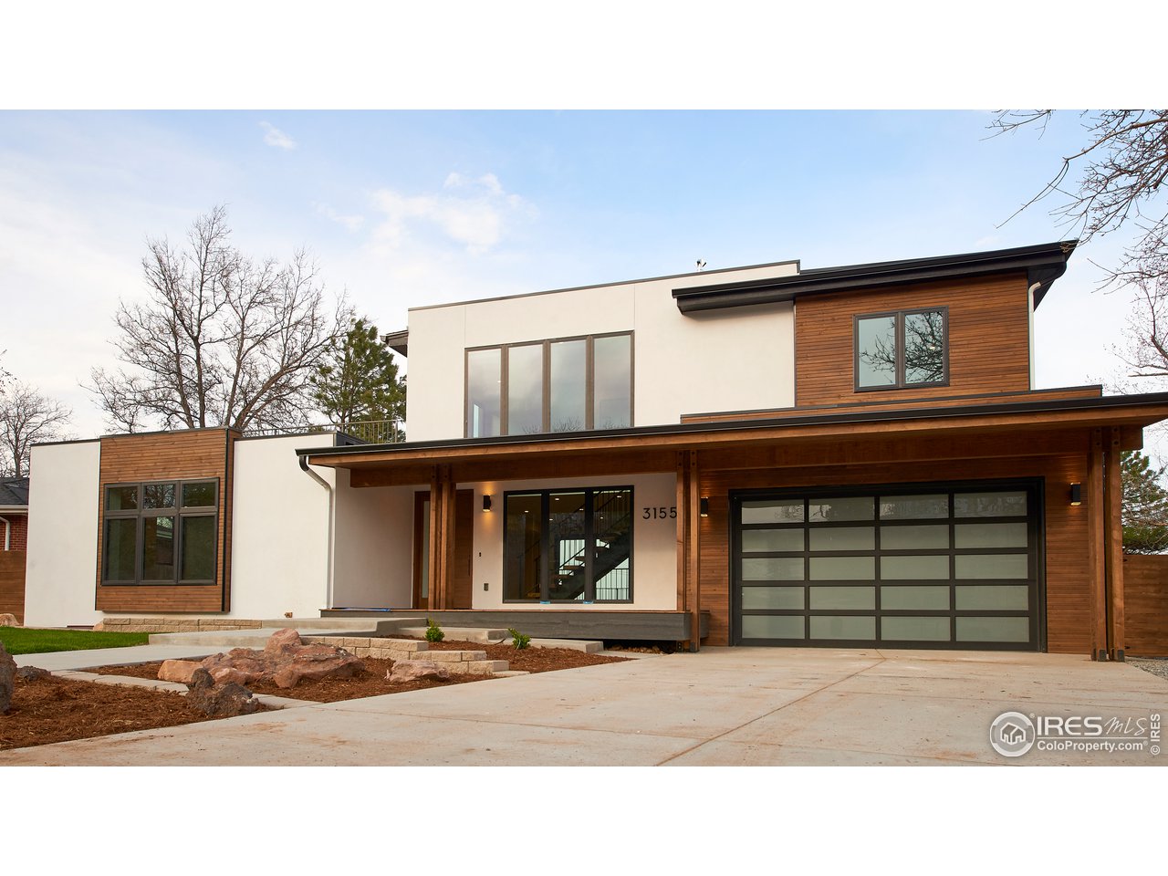 a black and white photo of a house