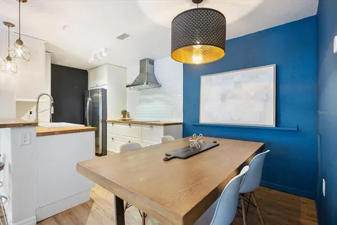 a view of living room with furniture and a window