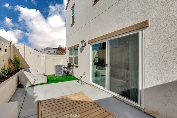 a view of a patio in backyard