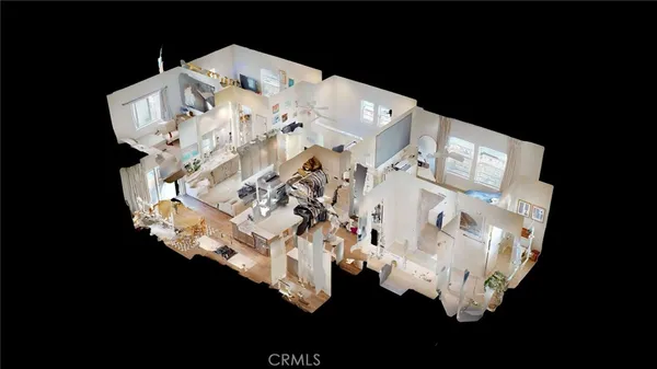 a balcony with furniture and a view of the back yard