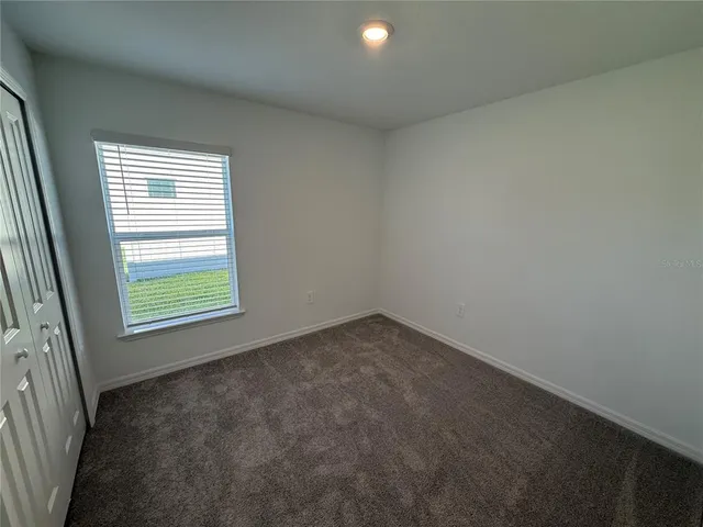 a view of an ocean from a mountain